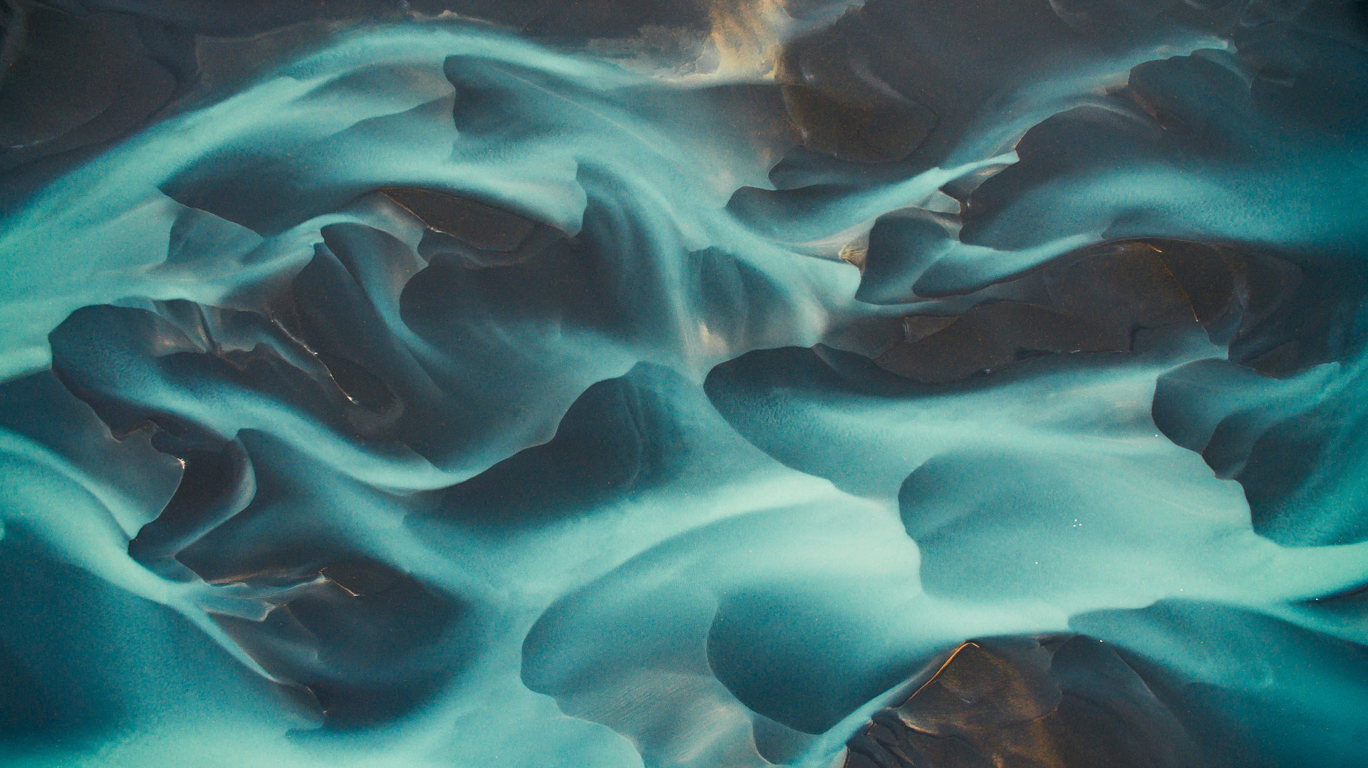Aerial drone view of a glacial river system in Iceland
